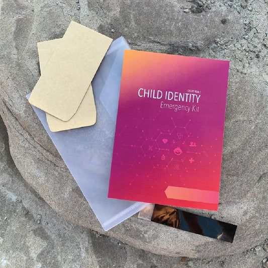 Child Identity kit showing the pamphlet, envelopes for DNA collection, ink strip for fingerprinting and the plastic sleeve that holds it all. Exclusively by Cheeky Pebble