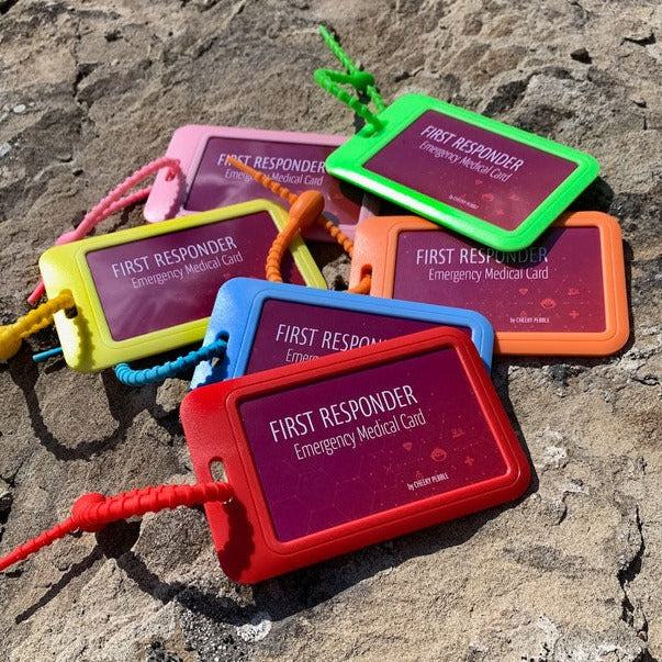 First responder Emergency Cards shown in Red, orange, yellow, green, blue and pink. Created and designed by Cheeky Pebble