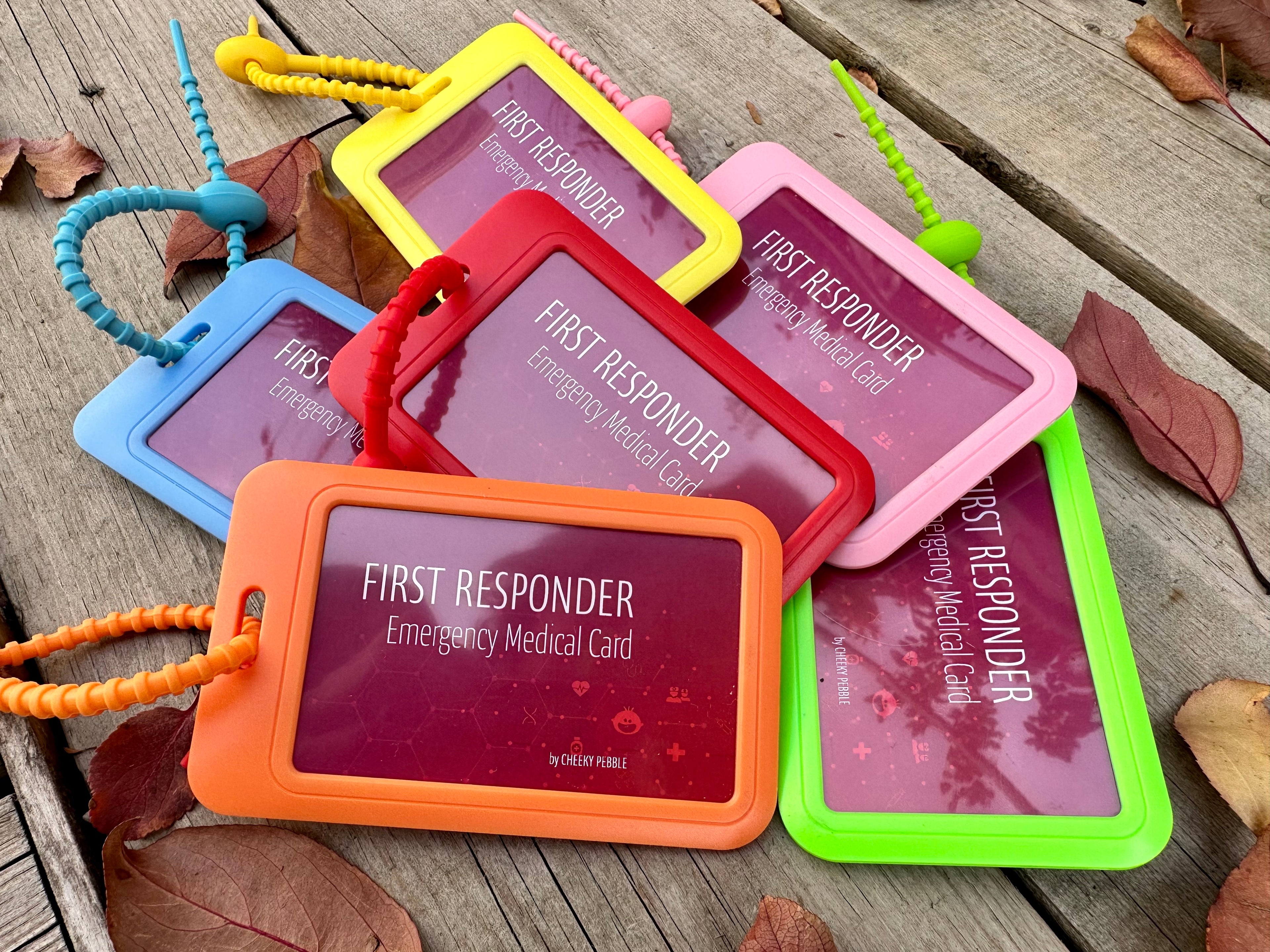 First responder Emergency Cards shown in Red, orange, yellow, green, blue and pink. Created and designed by Cheeky Pebble