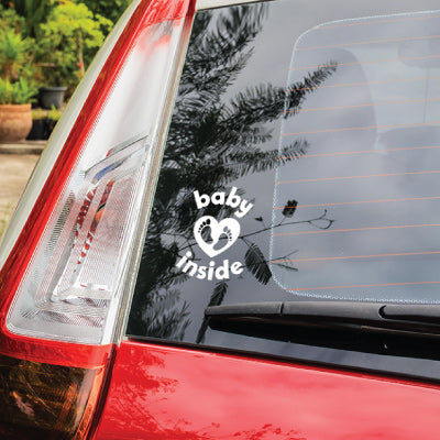 Picture of Baby Inside Tiny Toes back window decal on the back window of a vehicle. Only from Cheeky Pebble
