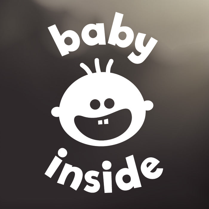 Large ‘Baby Inside’ white vinyl, back window decal by Cheeky Pebble with iconic Cheeky Pebble face. Designed for placement on dark, tinted vehicle windows. 