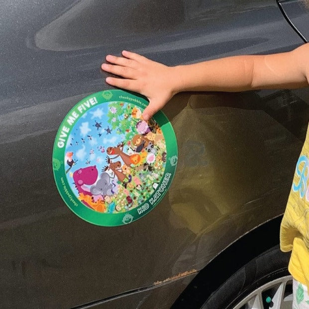 Give Me Five Kid Katcher Magnet Animal Design by Cheeky Pebble. Closeup of Animal magnet on silver vehicle with young girl touching the magnet.