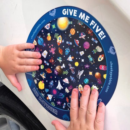 Give Me Five Kid Katcher Magnet Space Design by Cheeky Pebble. Closeup of Space magnet with young child’s hands on Give Me Five hand design.